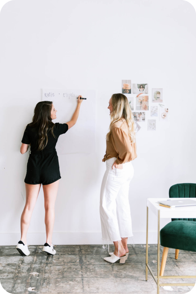 two women brainstorming